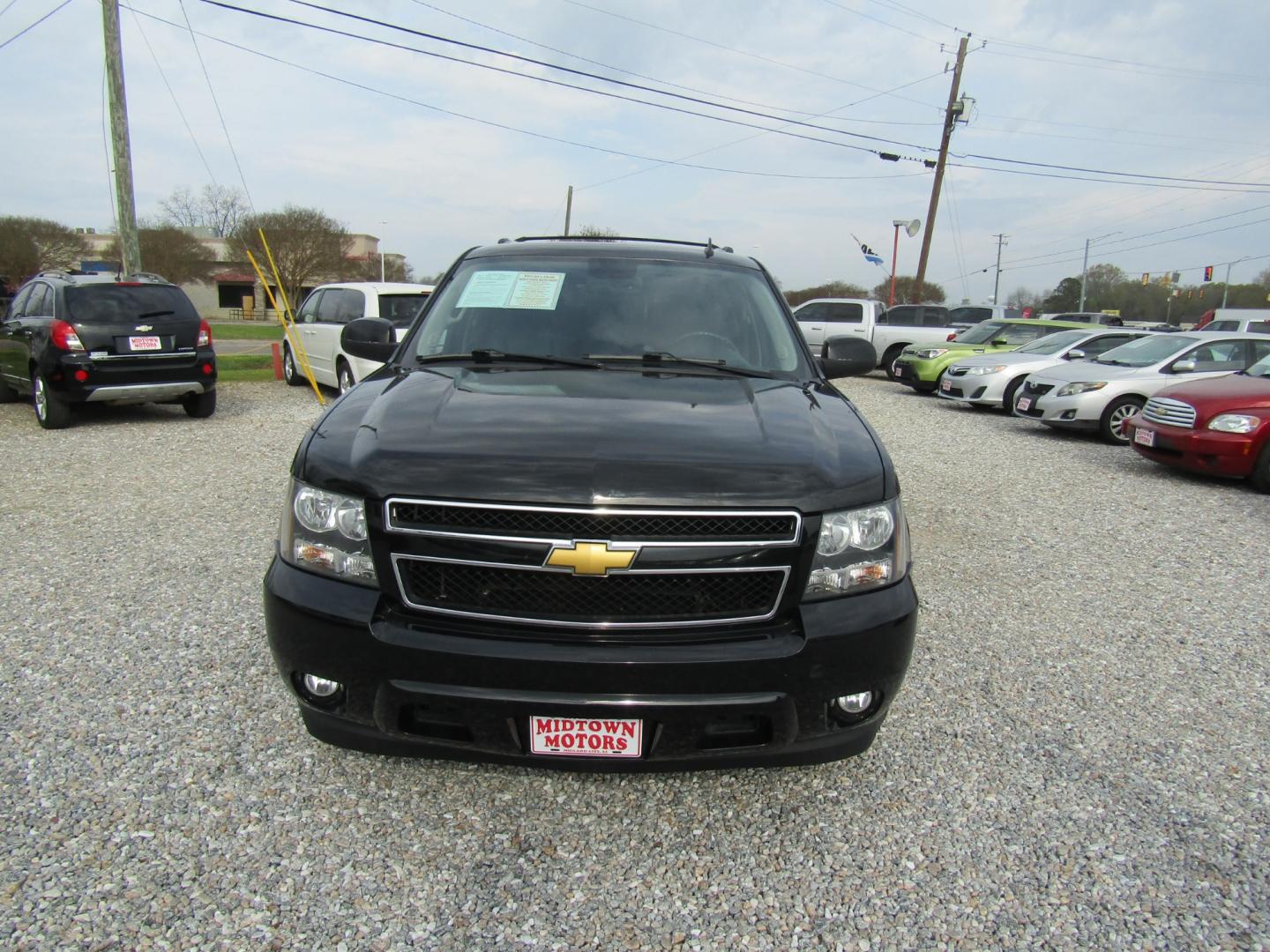 2014 Black /Black Chevrolet Suburban LT 1500 2WD (1GNSCJE00ER) with an 5.3L V8 OHV 16V FFV engine, Automatic transmission, located at 15016 S Hwy 231, Midland City, AL, 36350, (334) 983-3001, 31.306210, -85.495277 - Photo#1